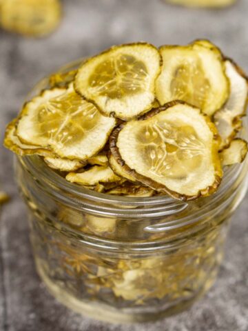 Dehydrated pickle chips in a jar